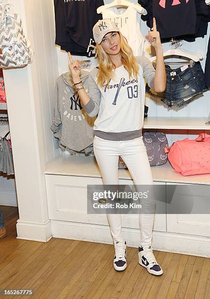 Model Jessica Hart celebrates opening day and the new MLB Pink Collection at Victoria's Secret PINK, Soho on April 2, 2013 in New York City.