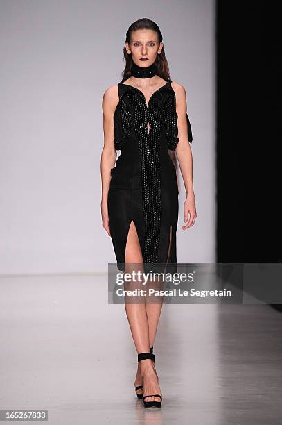 Model walks the runway at the Fyodor Golan show during Mercedes-Benz Fashion Week Russia Fall/Winter 2013/2014 at Manege on April 2, 2013 in Moscow,...