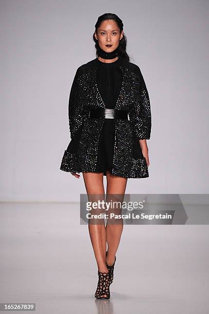 Model walks the runway at the Fyodor Golan show during Mercedes-Benz Fashion Week Russia Fall/Winter 2013/2014 at Manege on April 2, 2013 in Moscow,...