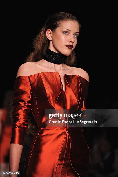 Model walks the runway at the Fyodor Golan show during Mercedes-Benz Fashion Week Russia Fall/Winter 2013/2014 at Manege on April 2, 2013 in Moscow,...