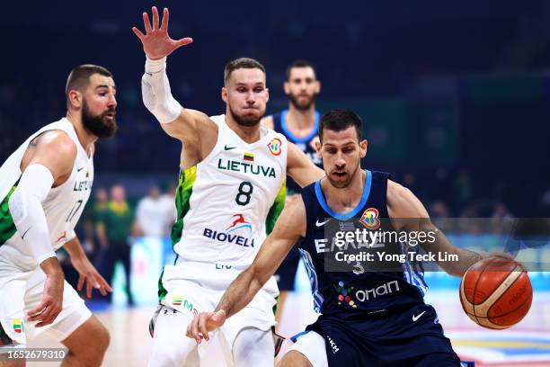 Michalis Lountzis of Greece controls the ball against Tadas Sedekerskis of Lithuania in the first quarter during the FIBA Basketball World Cup 2nd...