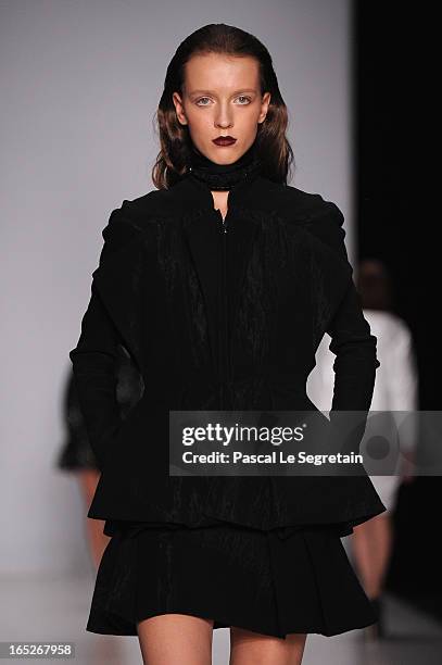 Model walks the runway at the Fyodor Golan show during Mercedes-Benz Fashion Week Russia Fall/Winter 2013/2014 at Manege on April 2, 2013 in Moscow,...