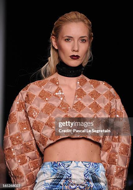 Model walks the runway at the Fyodor Golan show during Mercedes-Benz Fashion Week Russia Fall/Winter 2013/2014 at Manege on April 2, 2013 in Moscow,...