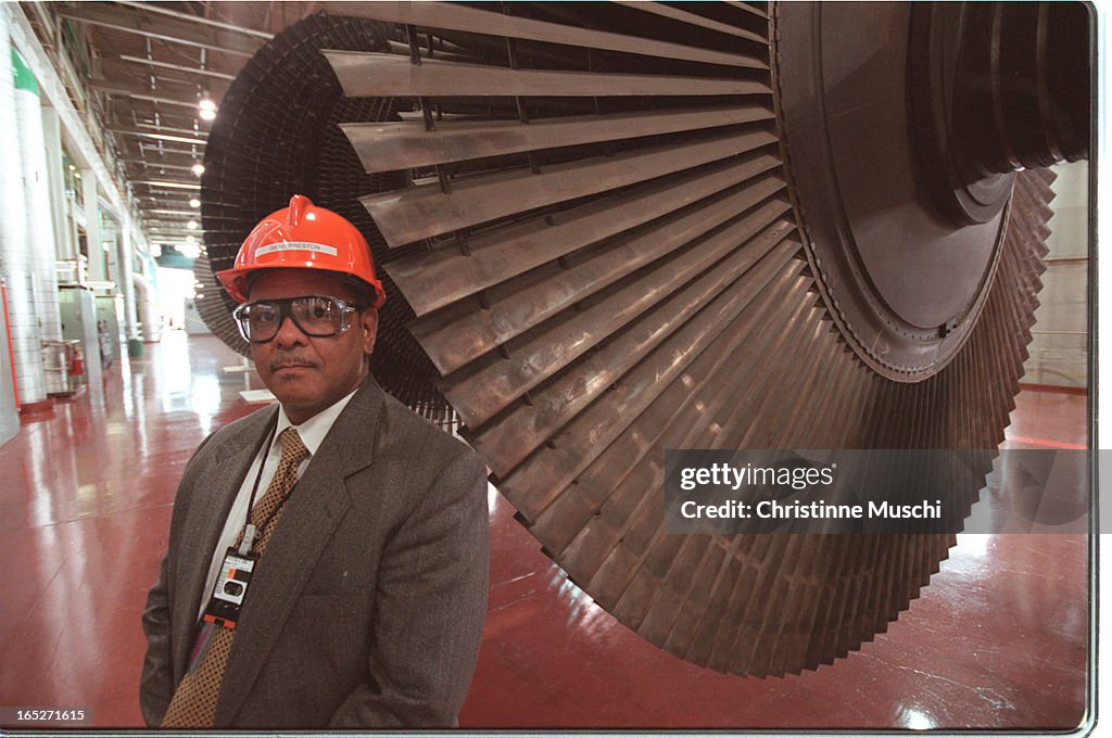 Outside view from pier. Loren Cunliffe, an authorized nuclear operator sits within the Main Control