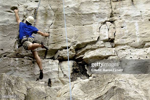 Climber Ian Galloway makes his way up a rock face at Rattlesnake Point. The Niagara escarpment at Rattlesnake Point is considered one of the best...