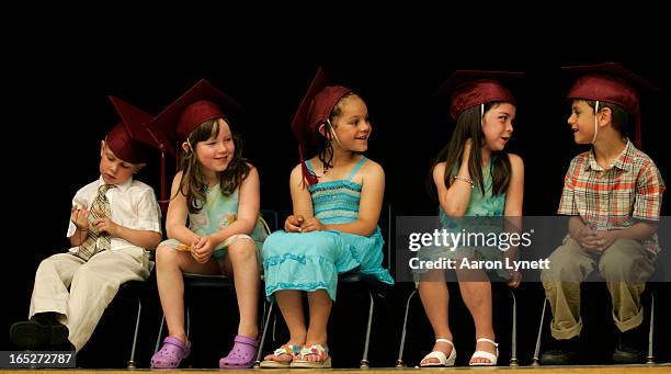 Kindergarten Grad.. The graduates of the 2007 Kindergarten graduation at Mother Cabrini Catholic School in Etobicoke. Left to right, Justin...