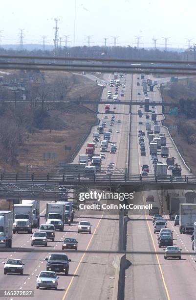 Pics of truck traffic on hwy 401 east and westbound taken from atop the hwy at mavis rd.to go with story on peel having lots of trucks on theirr hwys