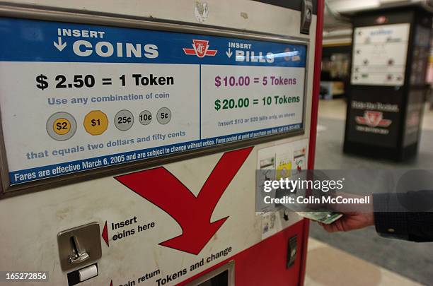 Pics of token dispenser at union station ttc subway where people are getting their tokens before ttc increase today.pics of money and token dispenser...