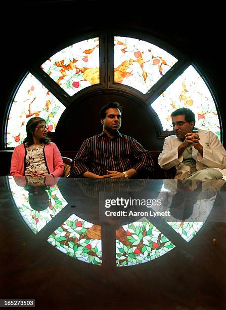 Ashok Verma and his wife Renu consult with cardiac surgeon Dr. Subdoh Verma in a conference room at St. Michael's Hospital, Monday, February 11,...