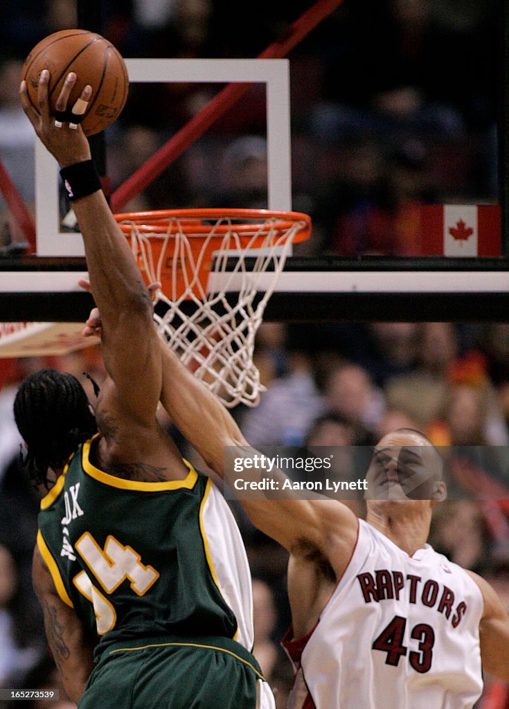 RAPTORS vs SUPERSONICS.03.09.2008. Toronto Raptors center Kris Humphries fouls Seattle SuperSonics f