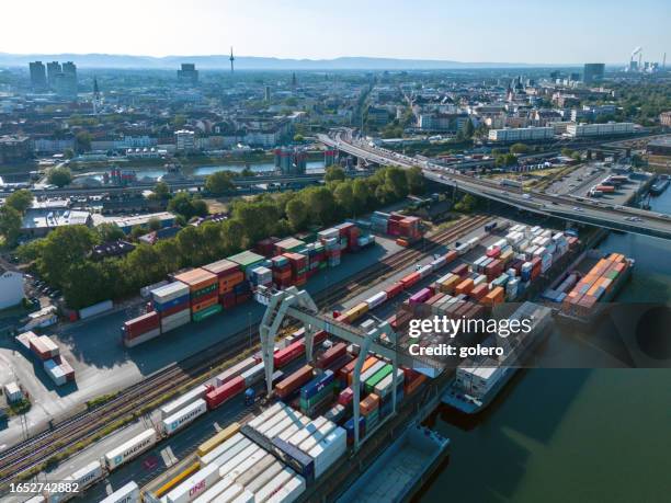 arial view on cargo container harbor in mannheim - rail transportation freight stock pictures, royalty-free photos & images