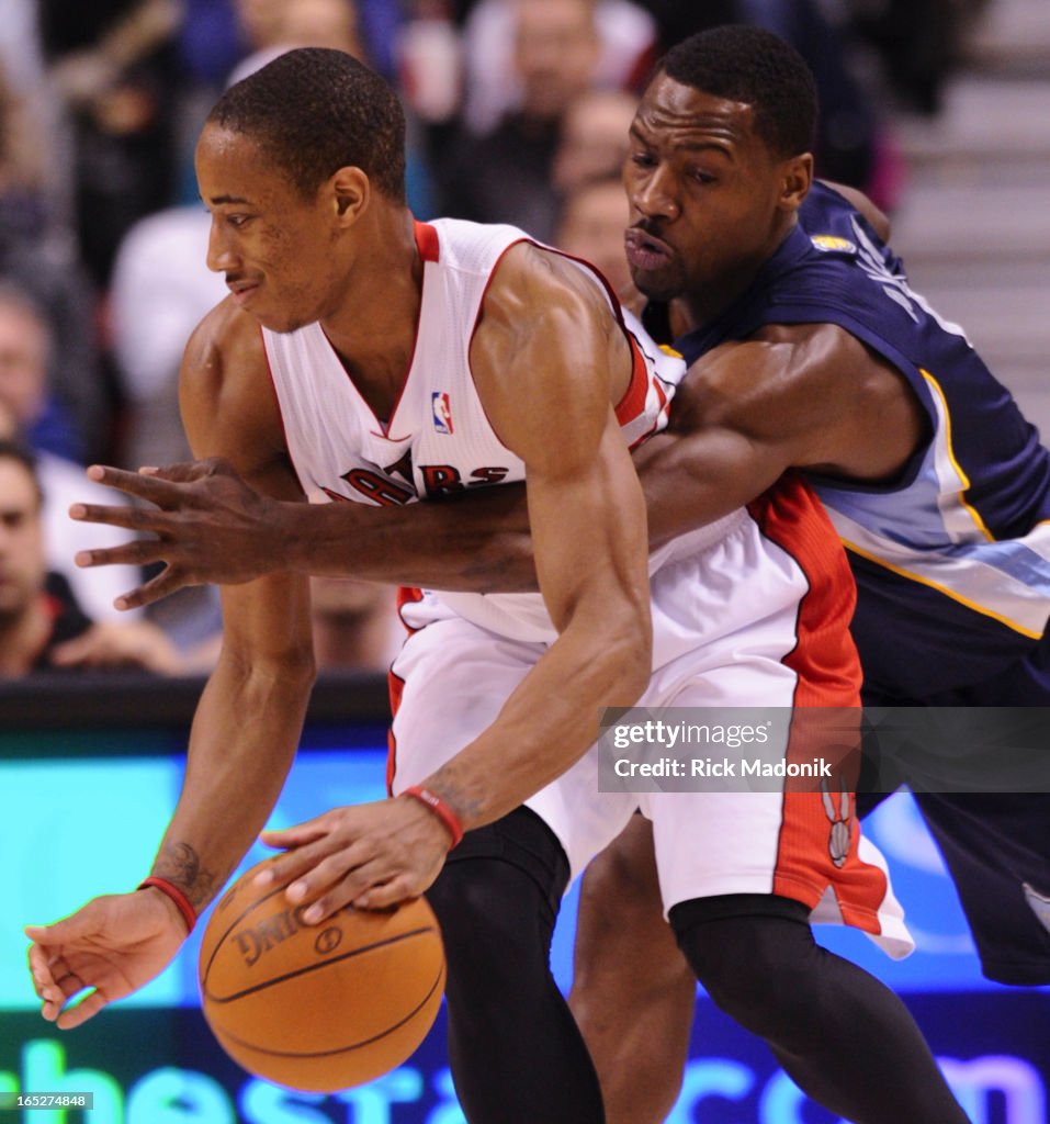 03/02/12 - TORONTO, ONTARIO - Grizzlies Tony Allen sneaks his hand inside on DeMar DeRozan during NB