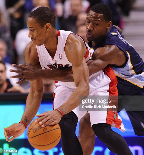 03/02/12 - TORONTO, ONTARIO - Grizzlies Tony Allen sneaks his hand inside on DeMar DeRozan during NB 03/02/12 - TORONTO, ONTARIO - Grizzlies Tony Allen sneaks his hand inside on DeMar DeRozan during NB