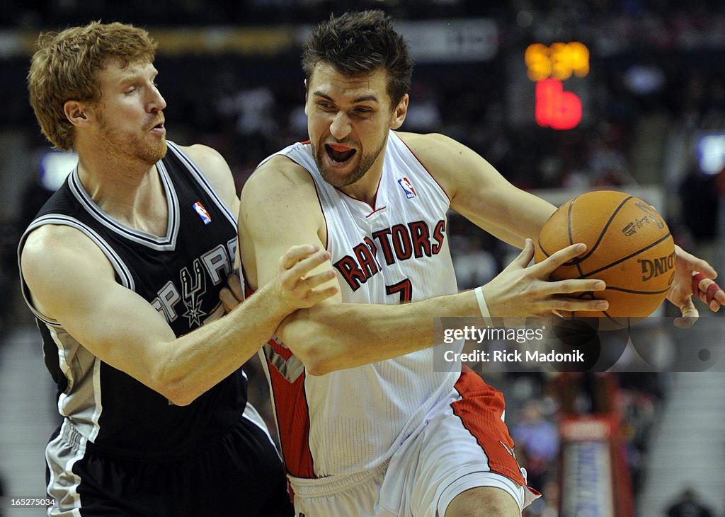 02/09/11 - TORONTO, ONTARIO - Spurs Matt Bonner defends against Andrea Bargnani during NBA action be