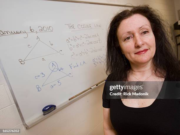 High school math teacher Josie Catalono MacPherson, in her classroom at Sir William Muock Secondary School, in Newmarket. She's standing at her white...