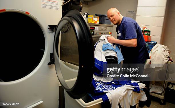 Shots of brad harrison,marlies equipment manager doing the tams laundry to go with story on the importance of clean hockey equipment in light of...