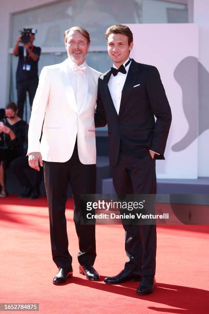 Mads Mikkelsen and Carl Jacobsen Mikkelsen attend a red carpet for the movie "Bastarden " at the 80th Venice International Film Festival on September...