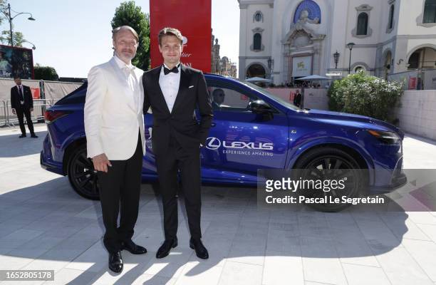 Mads Mikkelsen with his son Carl Jacobsen Mikkelsen arrive on the red carpet ahead of the "Bastarden" screening during the 80th Venice International...