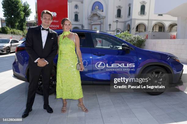 Carl Jacobsen Mikkelsen and guest arrive on the red carpet ahead of the "Bastarden" screening during the 80th Venice International Film Festival at...