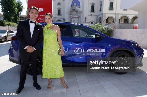 Carl Jacobsen Mikkelsen and guest arrive on the red carpet ahead of the "Bastarden" screening during the 80th Venice International Film Festival at...