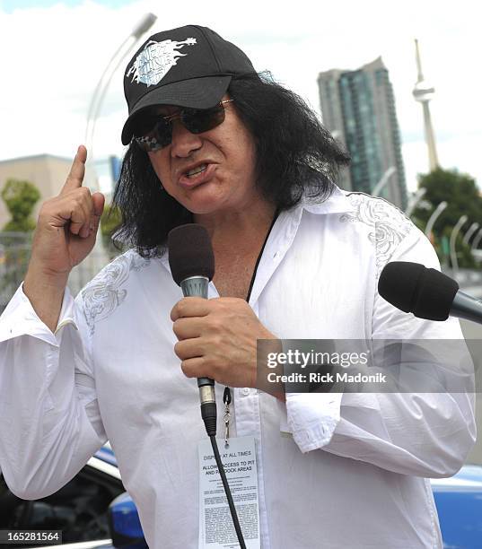 Bassist Gene Simons tells the drivers to "start their Honda engines" at the start of Toronto Honda Indy at Exhibition Place Sunday afternoon. Dario...