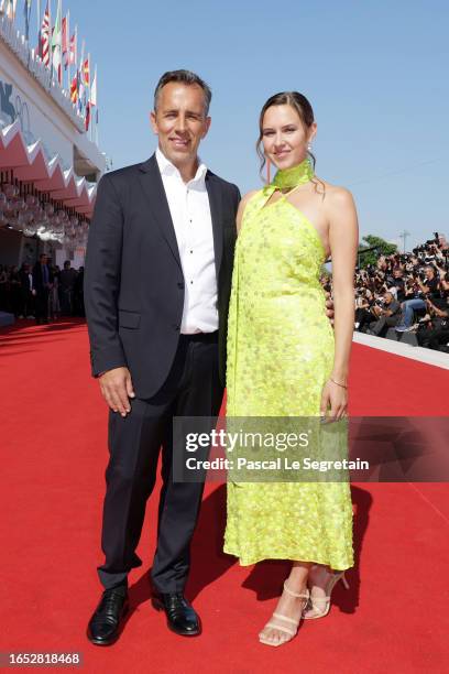 Director Nikolaj Arcel and guest arrive on the red carpet ahead of the "Bastarden" screening during the 80th Venice International Film Festival at...