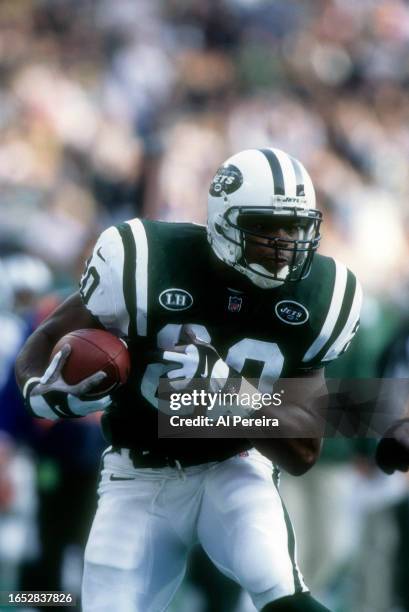 Running Back Richie Anderson of the New York Jets has a long gain in the game between the Seattle Seahawks and the New York Jets at The Meadowlands...