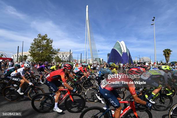 Geraint Thomas of The United Kingdom, Omar Fraile of Spain and Team INEOS Grenadiers and a general view of the peloton passing in front of the...