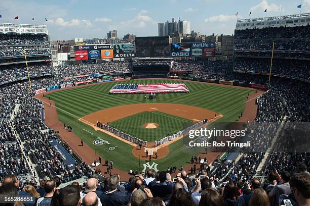 General view of Yankee Stadium during the National Anthem prior to the Opening Day game between the New York Yankees and the Boston Red Sox on...