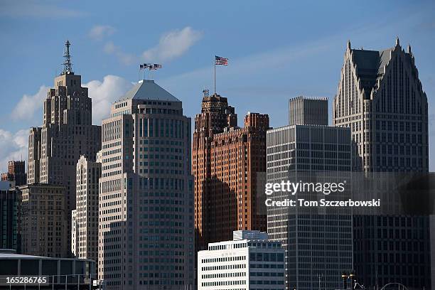 The Detroit city skyline viewed from Windsor after the Detroit Red Wings NHL game against the Chicago Blackhawks at Joe Louis Arena on March 31, 2013...