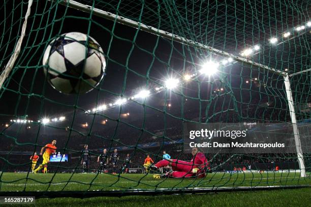 Xavi of Barcelona takes and scores a penalty for his teams second goal past goal keeper, Salvatore Sirigu of PSG during the UEFA Champions League...