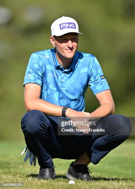 Adrian Meronk of Poland prepares to play his shot on the 14th hole during Day Two of the Omega European Masters at Crans-sur-Sierre Golf Club on...