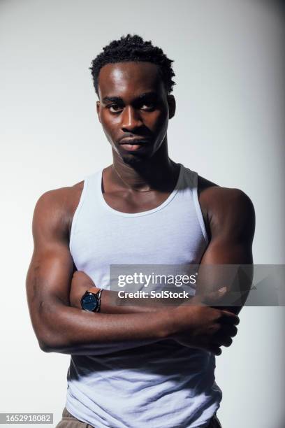 black guy in a vest - tank top stock pictures, royalty-free photos & images