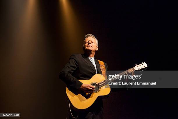 Australian guitarist Tommy Emmanuel performs at La Cigale on April 2, 2013 in Paris, France.