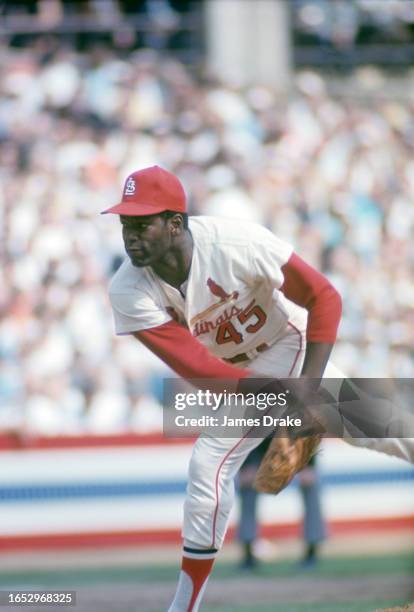 Bob Gibson of the St. Louis Cardinals throws a pitch during Game One of the World Series against the Detroit Tigers at Busch Stadium on October 2,...