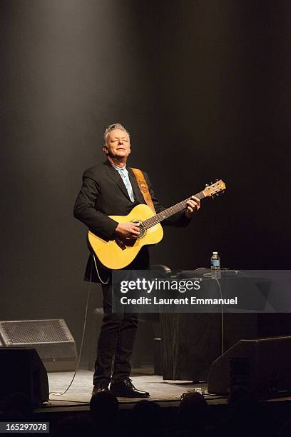 Australian guitarist Tommy Emmanuel performs at La Cigale on April 2, 2013 in Paris, France.