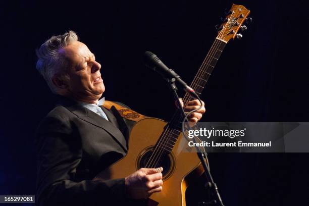 Australian guitarist Tommy Emmanuel performs at La Cigale on April 2, 2013 in Paris, France.