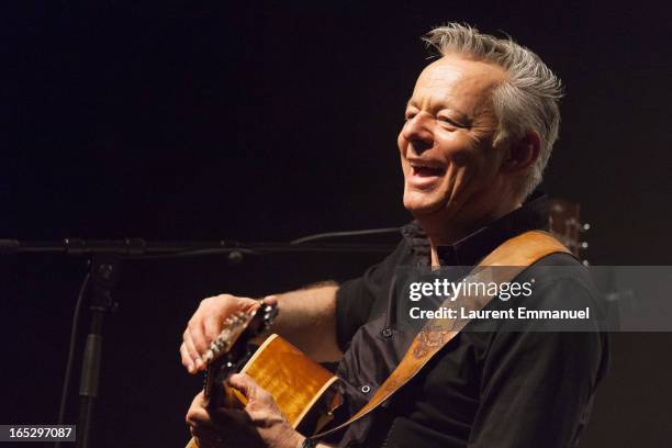 Australian guitarist Tommy Emmanuel performs at La Cigale on April 2, 2013 in Paris, France.