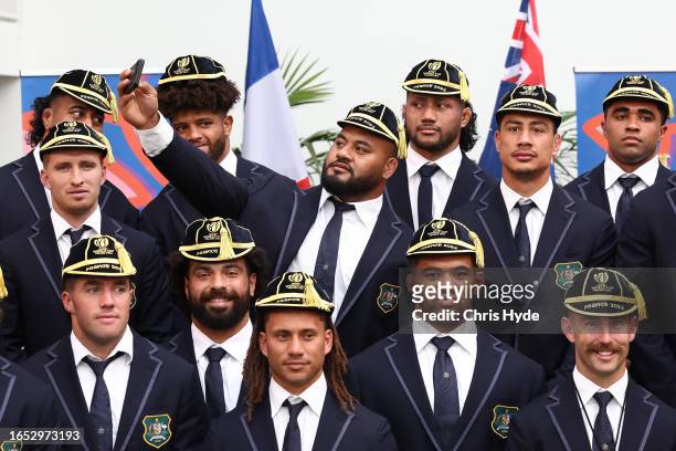 Taniela Tupou takes a photograph during the Australia Wallabies Official Rugby World Cup Welcome Ceremony ahead of the Rugby World Cup France 2023,...
