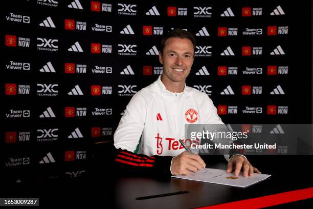 Jonny Evans of Manchester United poses after signing for the club at Carrington Training Ground on September 01, 2023 in Manchester, England.