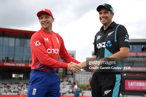 England captain Jos Buttler shakes hands with New Zealand captain Tim Southee ahead of the 2nd Vitality T20 International between England and New...