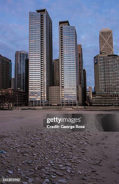 New highrise condominium buildings along Lakeshore Drive are viewed from Ohio Street Beach on March 26, 2013 in Chicago, Illinois. Visitors to the...