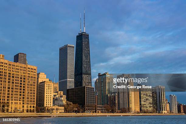 The downtown skyline, including the John Hancock Building and Lakeshore Drive, is viewed from Ohio Street Beach on March 26, 2013 in Chicago,...