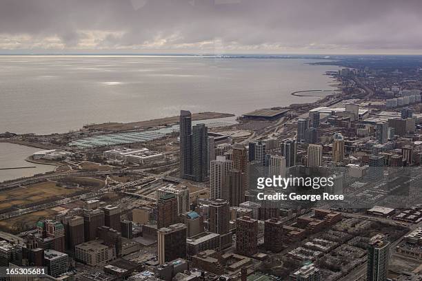The downtown skyline looking south from the Willis Tower Sky Deck Observatory is shown on March 25, 2013 in Chicago, Illinois. Visitors to the Windy...