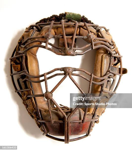 Vintage Baseball Catcher's Mask. Early 1920's catcher's mask features unique beaded welds with goggle eyes and classic spitter design.