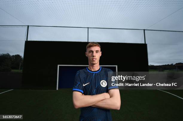 Cole Palmer poses for a photograph as he signs for Chelsea FC at Chelsea Training Ground on September 01, 2023 in Cobham, England.