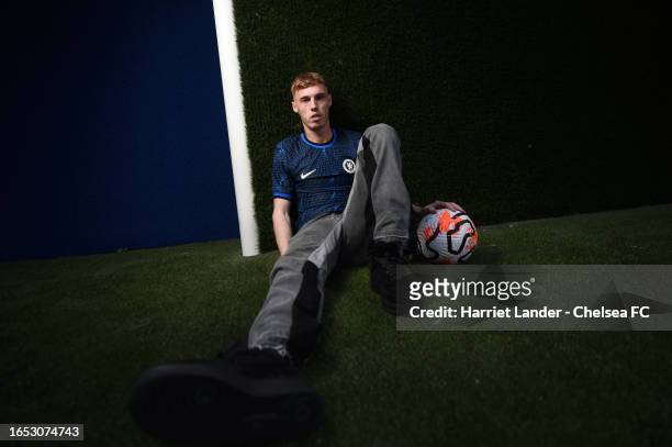 Cole Palmer poses for a photograph as he signs for Chelsea FC at Chelsea Training Ground on September 01, 2023 in Cobham, England.