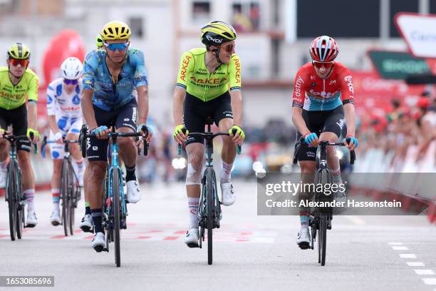 Andrey Zeits of Kazakhstan and Astana Qazaqstan Team, Michel Ries of Luxembourg and Team Arkéa-Samsic and Sylvain Moniquet of Belgium and Team Lotto...