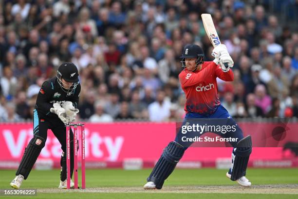 England batsman Jonny Bairstow hits out watched by New Zealand wicketkeeper Tim Seifert during the 2nd Vitality T20I match between England and New...