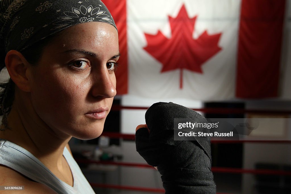 Three time World Champion Mary Spencer spars with former Canadian champion Jason Hurst as she tries